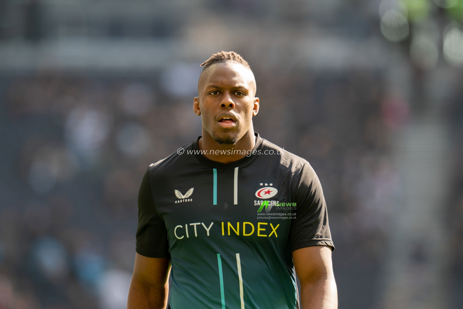 Maro Itoje #4 of Saracens warming up prior to the game
