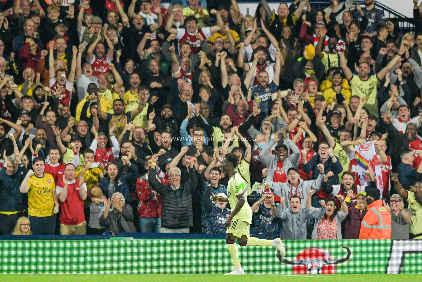 Bukayo Saka #7 of Arsenal celebrates scoring a goal to make it 0-4