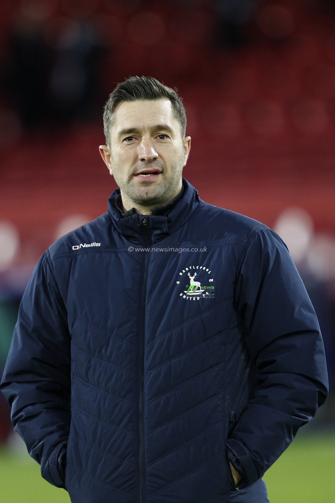 Graeme Lee manager of Hartlepool United looks downbeat at full time