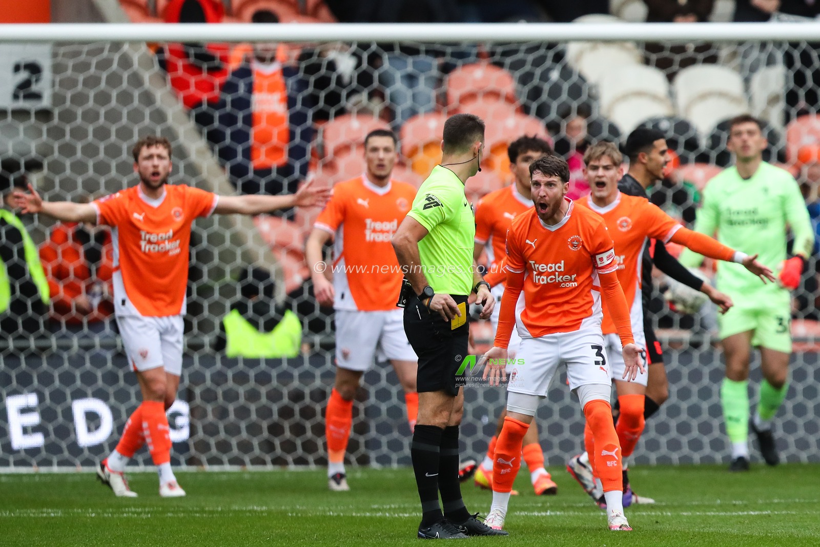 James Husband of Blackpool appeals to referee Tom Nield following the goal to make it 0-1 during the Emirates FA Cup 2nd Round match Blackpool vs Birmingham City at Bloomfield Road, Blackpool, United Kingdom, 1st December 2024

(Photo by Gareth Evans/News Images)