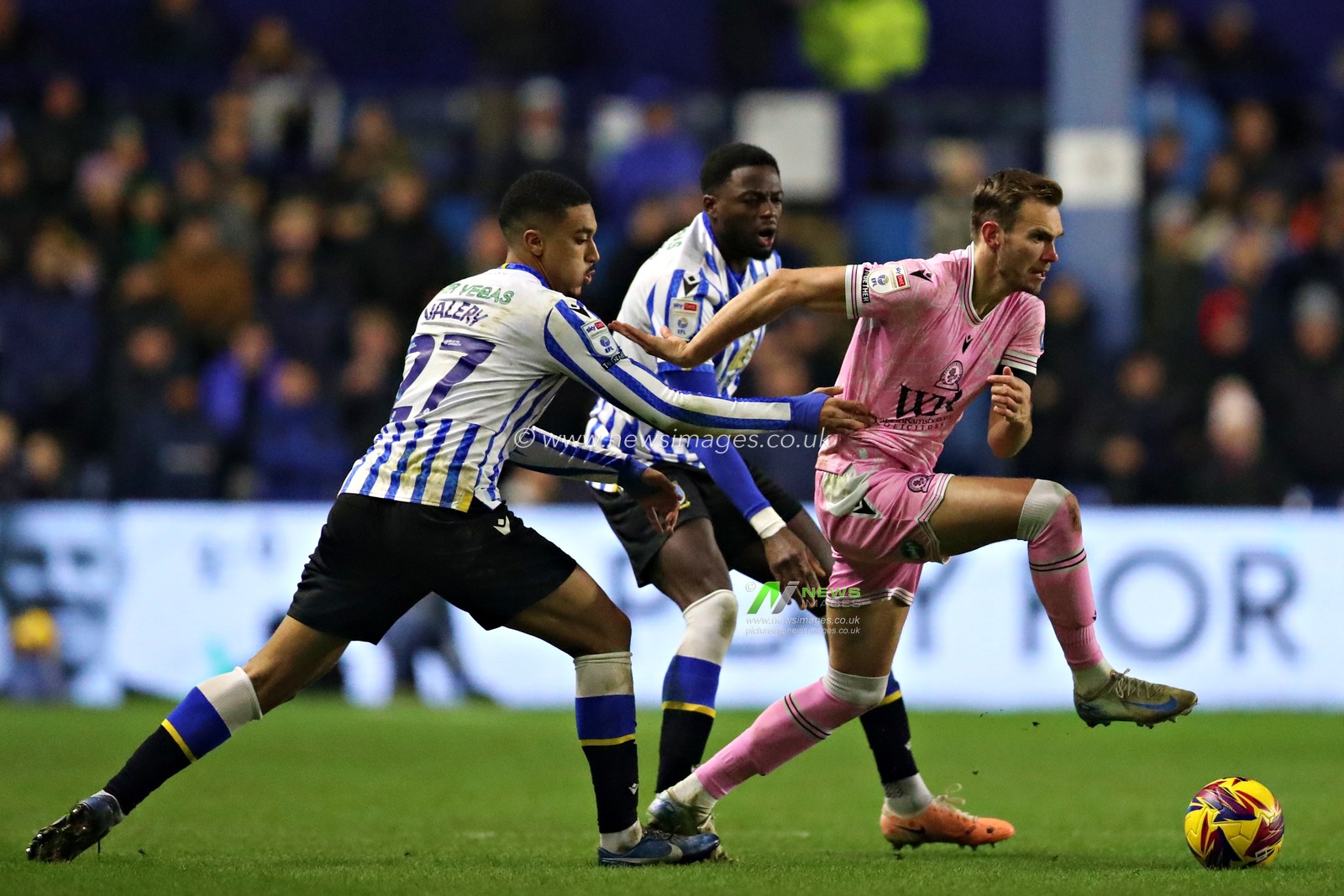 Ryan Hedges of Blackburn Rovers is pressured by Yan Valery of Sheffield Wednesday during the Sky Bet Championship match Sheffield Wednesday vs Blackburn Rovers at Hillsborough, Sheffield, United Kingdom, 10th December 2024

(Photo by Sam Eaden/News Images)
