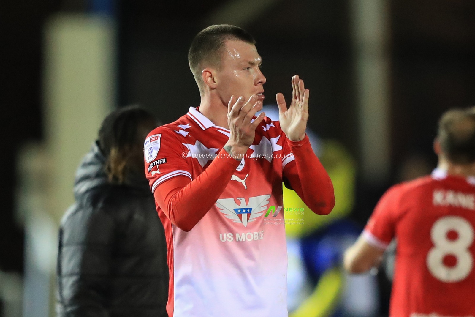 Kacper Åopata #4 of Barnsley applauds the travelling fans after a 2-2 draw during the Sky Bet League 1 match Peterborough United vs Barnsley at Weston Homes Stadium, Peterborough, United Kingdom, 29th December 2023

(Photo by Alfie Cosgrove/News Images)