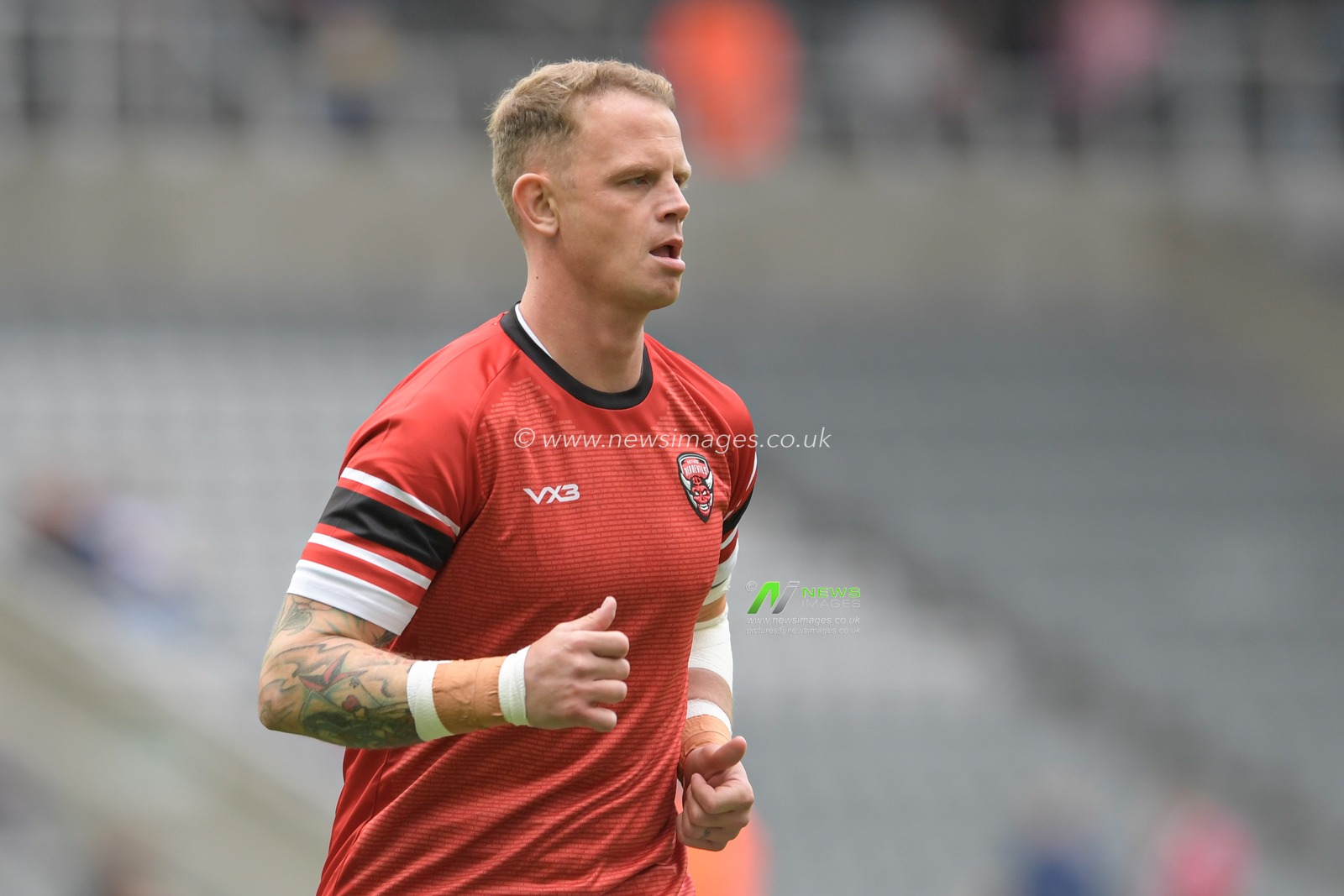 Kevin Brown (7) of Salford Red Devils during the warm up