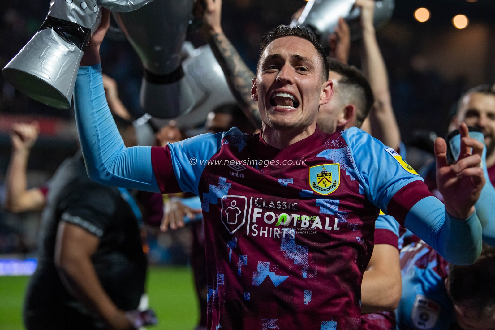 Connor Roberts #14 of Burnley celebrates after his side wins the championship title during the Sky Bet Championship match Blackburn Rovers vs Burnley at Ewood Park, Blackburn, United Kingdom, 25th April 2023

(Photo by Craig Thomas/News Images)