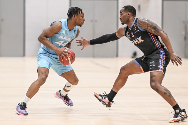 Di-jani Parkinson of Surrey Scorchers under pressure from LaQuincy Rideau of Cheshire Phoenix during the British Basketball Championship match Cheshire Phoenix vs Surrey Scorchers at Ellesmere Port Sports Village, Ellesmere Port, United Kingdom, 19th November 2023

(Photo by Craig Thomas/News Images)
