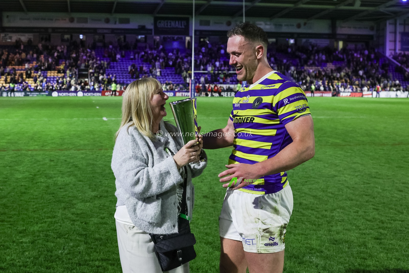 Ben Currie of Warrington Wolves is presented with the The Warrington and Wigan Challenge Cup trophy during the Betfred Super League round 9 match Warrington Wolves vs Wigan Warriors at The Halliwell Jones Stadium, Warrington, United Kingdom on 24 April 2026

(Photo by Mark Cosgrove/News Images)