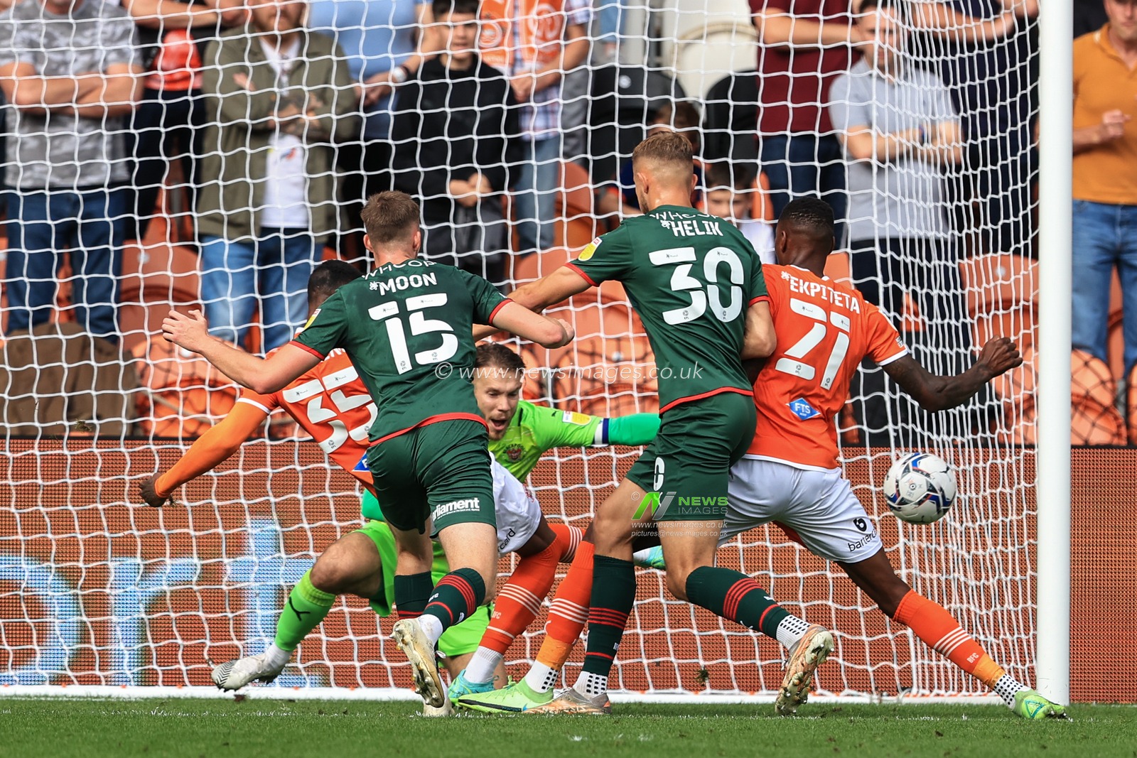 Dujon Sterling #35 of Blackpool clears the ball off his own line