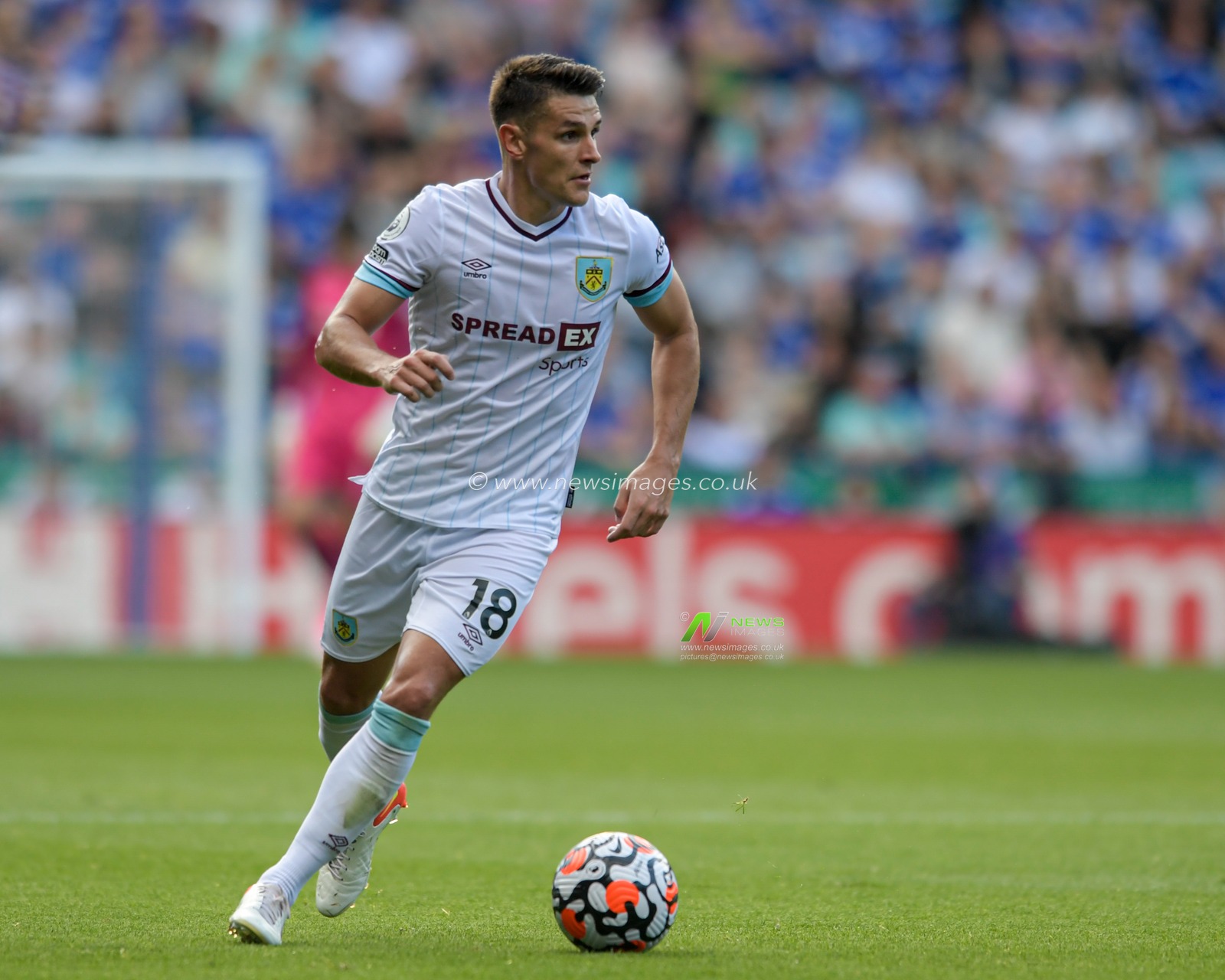 Ashley Westwood #18 of Burnley runs with the ball