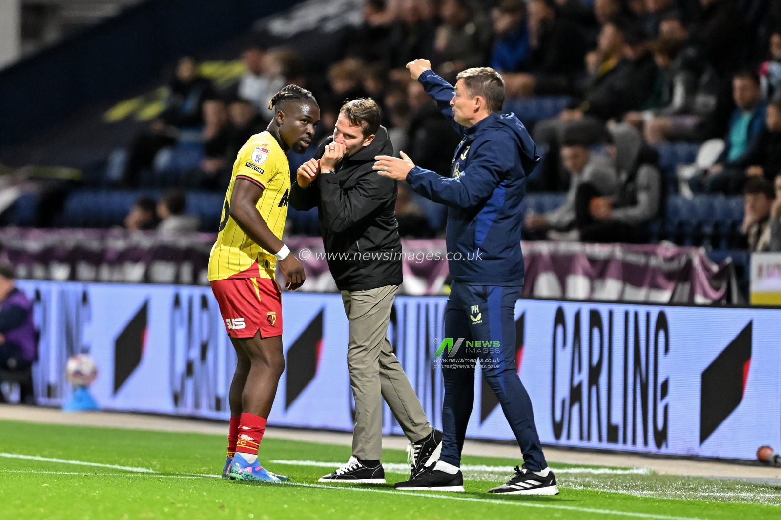 Tom Cleverley manager of Watford speaks with Festy Ebosele of Watford during the Sky Bet Championship match Preston North End vs Watford at Deepdale, Preston, United Kingdom, 2nd October 2024

(Photo by Cody Froggatt/News Images)