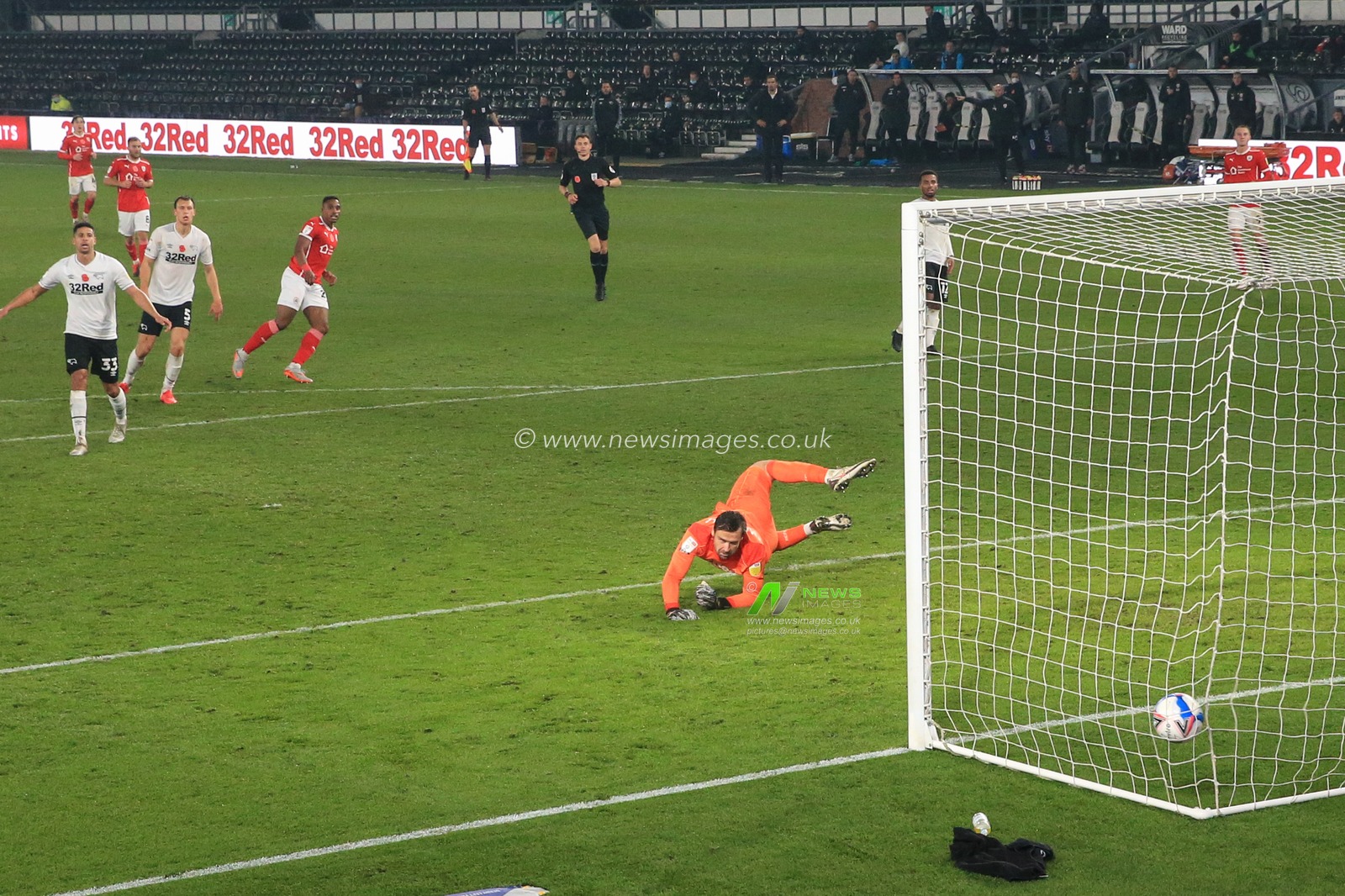 Victor Adeboyejo #29 of Barnsley scores to make it 0-2