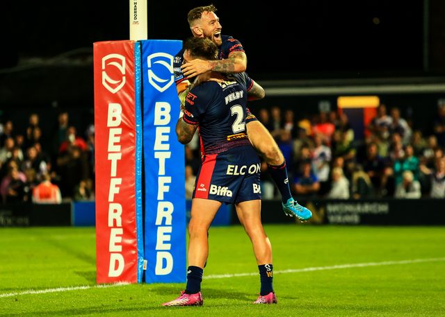 Kyle Feldt of St. Helens celebrates his try during the Betfred Super League round 21 match Wakefield Trinity vs St Helens at DIY Kitchens Stadium, Wakefield, United Kingdom, 8th August 2025

(Photo by Richard Bierton/News Images)