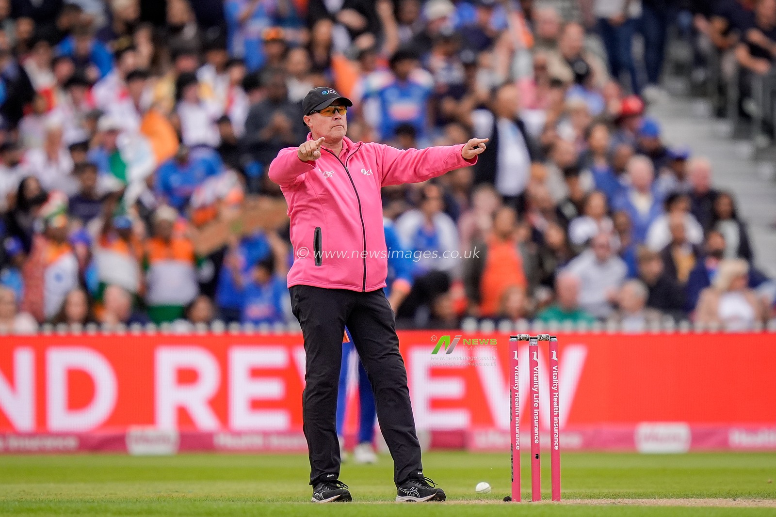 Umpire Graham Lloyd refers an lbw decision to the TV umpire after an England review during the Second Vitality T20 International match England vs India at Old Trafford, Manchester, United Kingdom on 04 July 2026

(Photo by Maynard Manyowa/News Images)