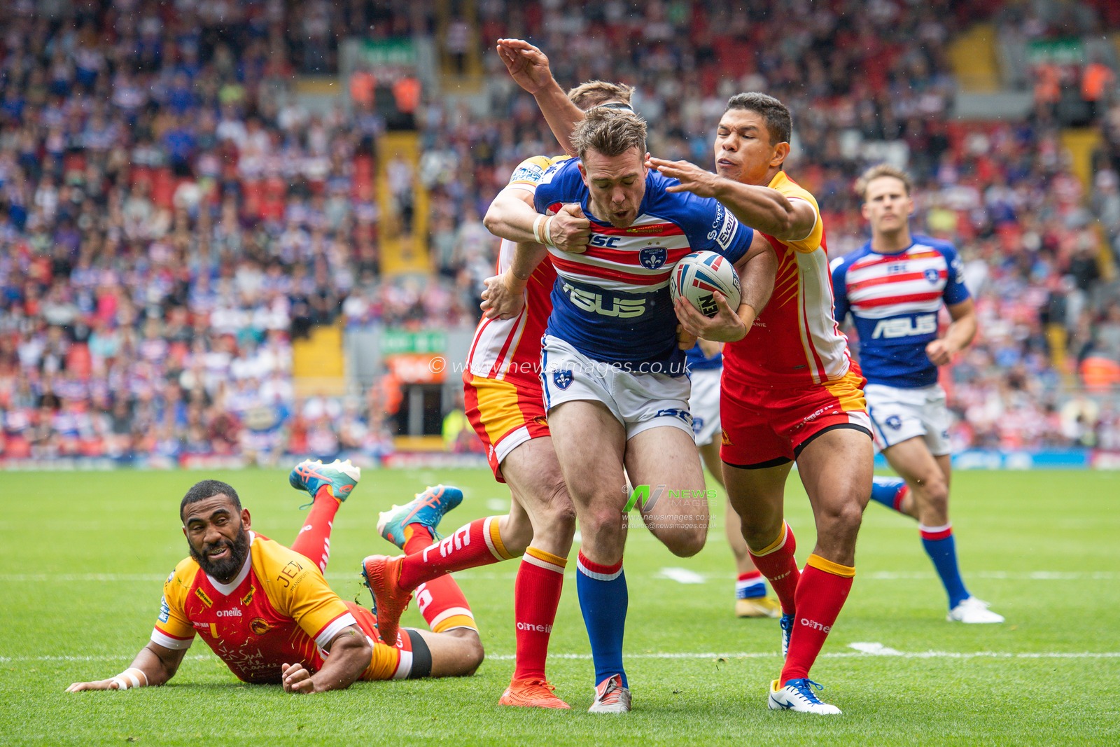 25th May 2019 , Anfield Stadium, Liverpool, England; Dacia Magic Weekend, Betfred Super League Round 16, Wakefield Trinity vs Catalans Dragons ; Matty Ashurst (11) of Wakefield Trinity makes a break

Credit: Craig Thomas/News Images