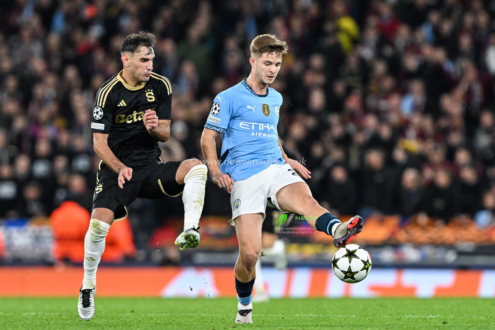 James McAtee of Manchester City passes the ball during the UEFA Champions League, League Stage Manchester City v Sparta Prague at Etihad Stadium, Manchester, United Kingdom, 23rd October 2024

(Photo by Cody Froggatt/News Images)