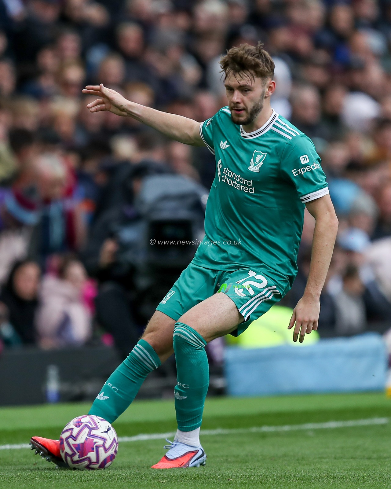 Conor Bradley of Liverpool with ball at his feet during the Premier League match Burnley vs Liverpool at Turf Moor, Burnley, United Kingdom, 14th September 2025

(Photo by Jorge Horsted/News Images)