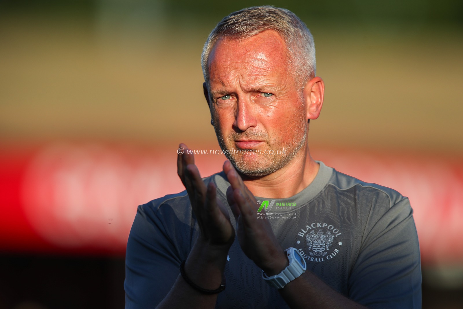 Neil Critchley manager of Blackpool applauds the travelling fans after the Sky Bet League 1 match Crawley Town vs Blackpool at Broadfield Stadium, Crawley, United Kingdom, 10th August 2024

(Photo by Gareth Evans/News Images)