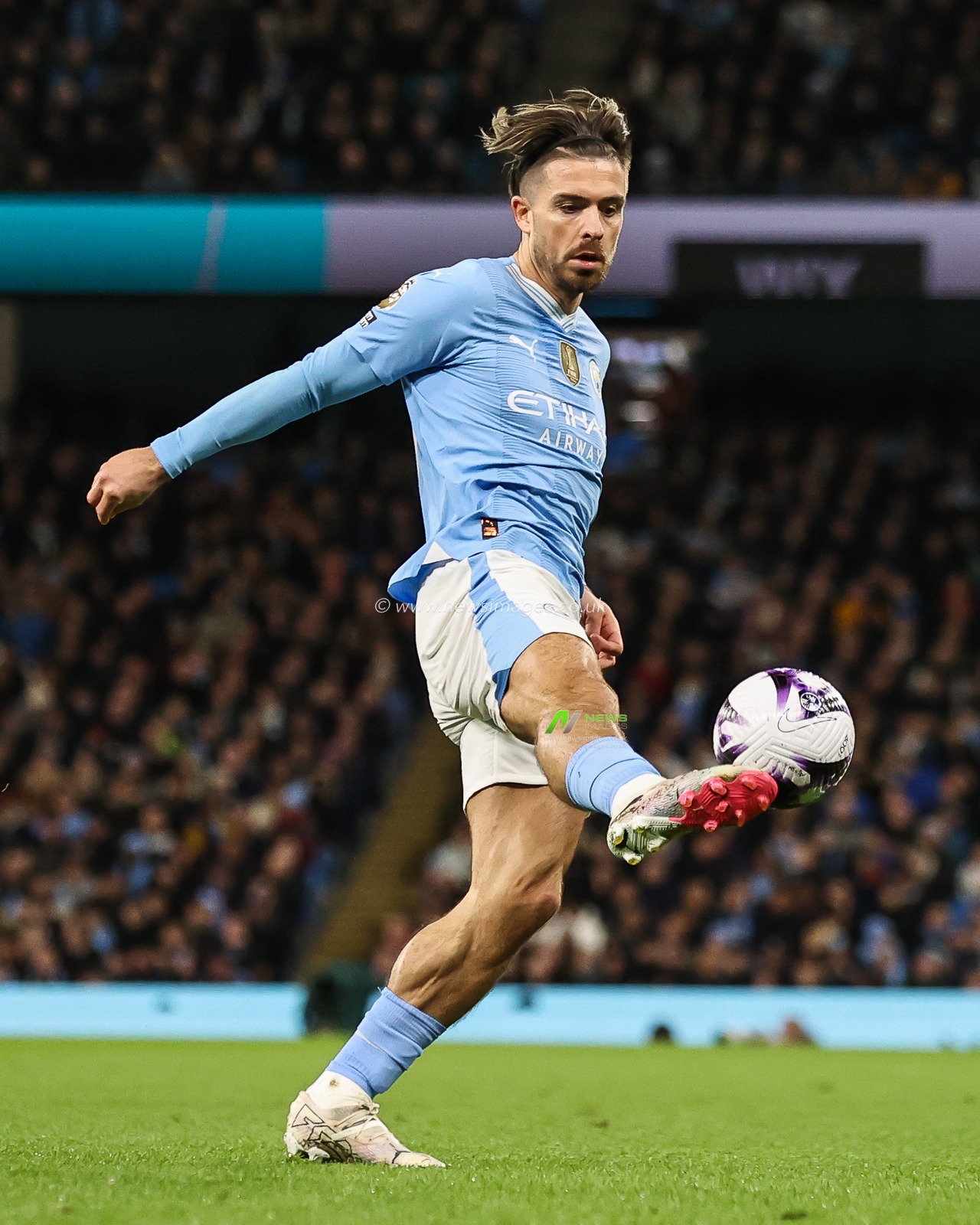 Jack Grealish of Manchester City controls the ball during the Premier League match Manchester City vs Aston Villa at Etihad Stadium, Manchester, United Kingdom, 3rd April 2024

(Photo by Mark Cosgrove/News Images)