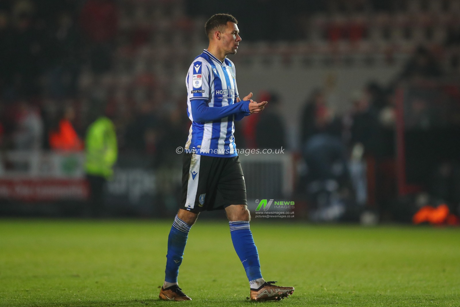 Marvin Johnson #18 of Sheffield Wednesday applauds the travelling fans after the Sky Bet League 1 match Exeter City vs Sheffield Wednesday at St James' Park, Exeter, United Kingdom, 10th December 2022

(Photo by Gareth Evans/News Images)