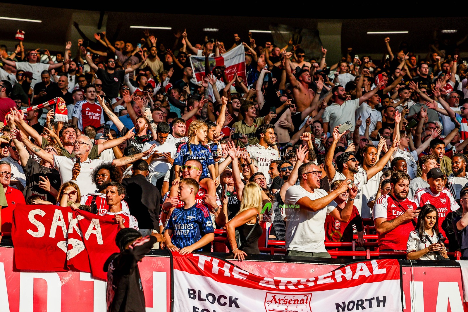Arsenal fans celebrate after the teams victory following the Premier League match Manchester United vs Arsenal at Old Trafford, Manchester, United Kingdom, 17th August 2025

(Photo by Mark Cosgrove/News Images)