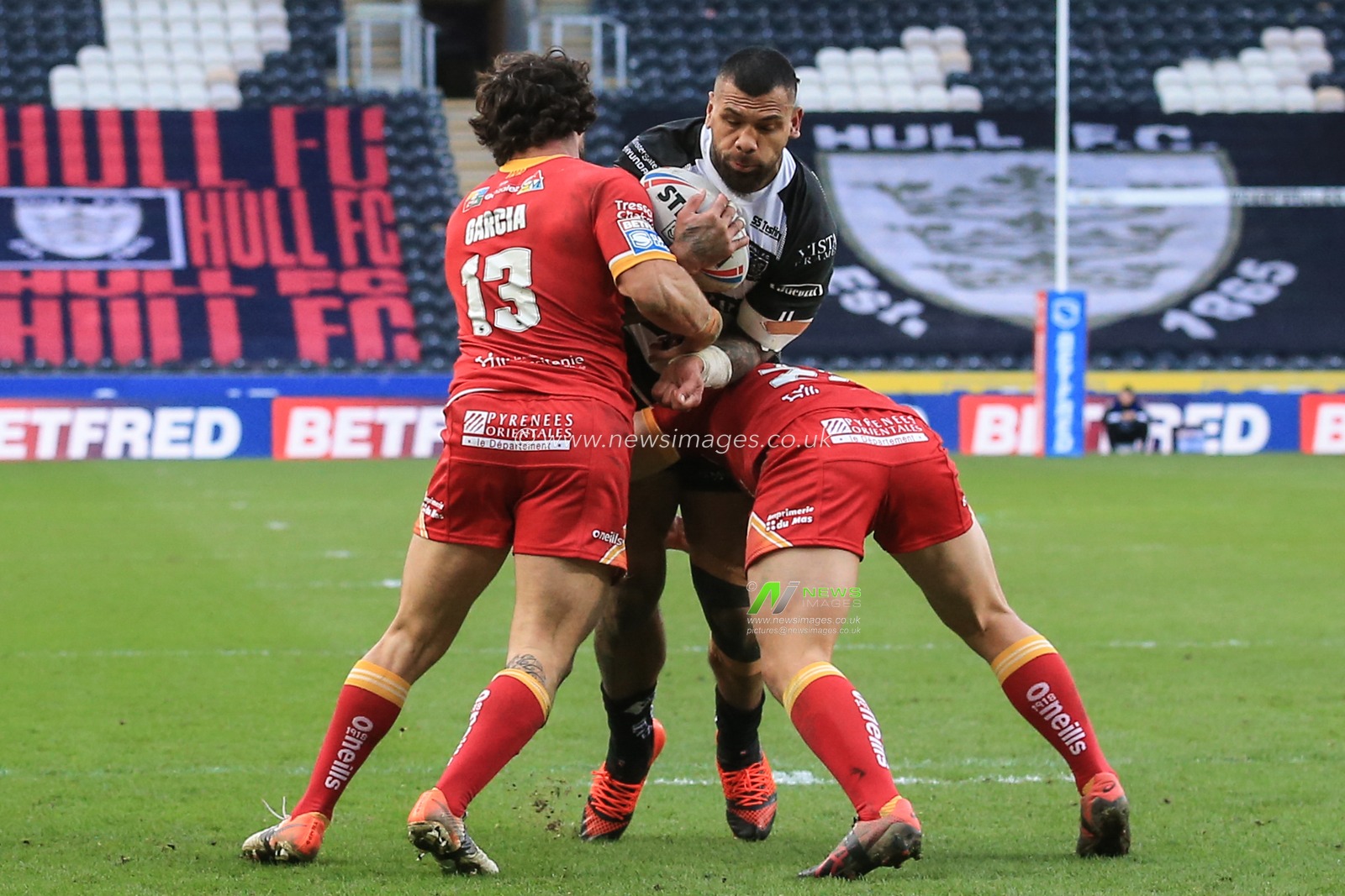 1st March 2020, KCOM Stadium, Hull, England; Betfred Super League, Hull FC v Catalans Dragons : Manu Maâ€™u (12) of Hull FC is stopped by the Catalans defence