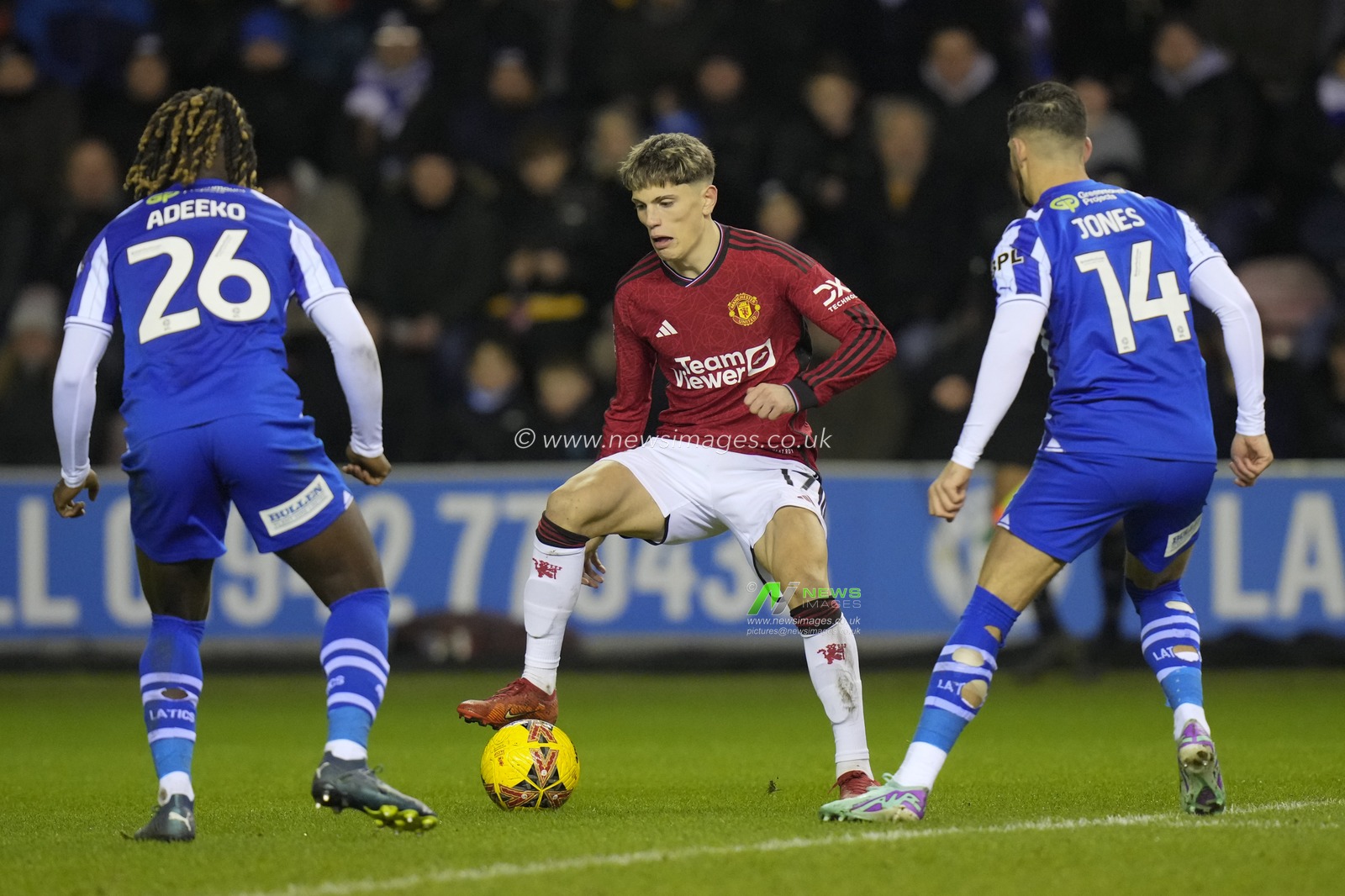 Alejandro Garnacho of Manchester United runs at the Wigan Athletic defence during the Emirates FA Cup Third Round match Wigan Athletic vs Manchester United at DW Stadium, Wigan, United Kingdom, 8th January 2024

(Photo by Steve Flynn/News Images)