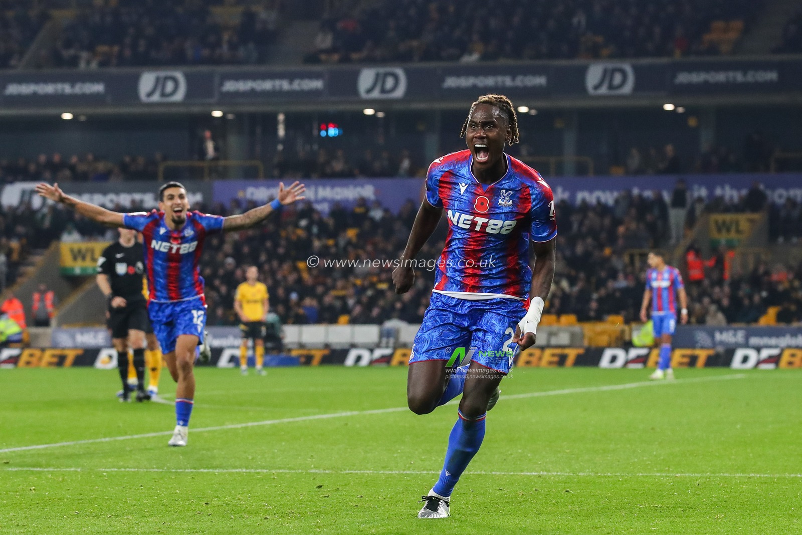 Trevoh Chalobah of Crystal Palace celebrates his goal to make it 0-1 during the Premier League match Wolverhampton Wanderers vs Crystal Palace at Molineux, Wolverhampton, United Kingdom, 2nd November 2024

(Photo by Gareth Evans/News Images)
