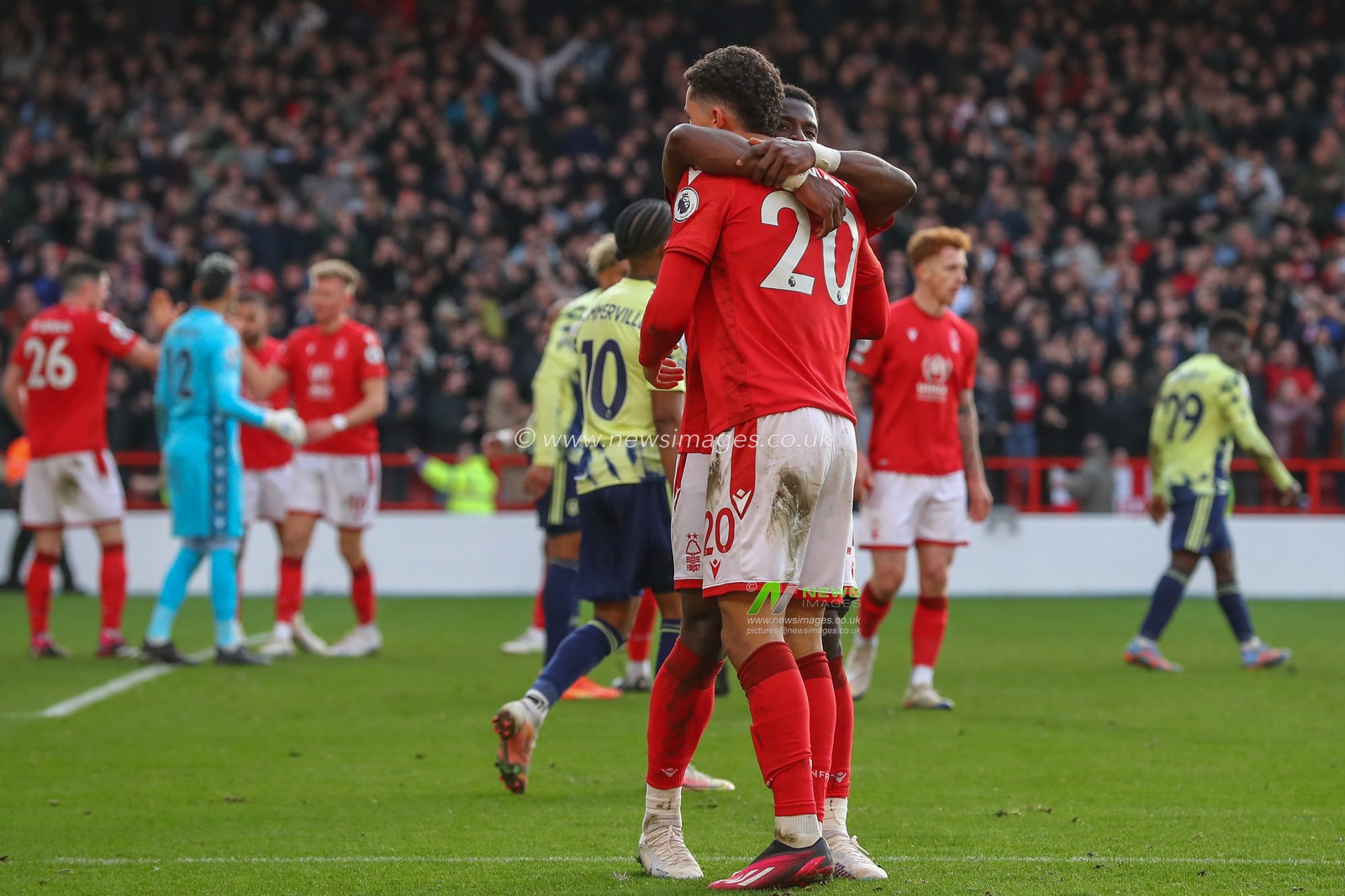 Brennan Johnson #20 of Nottingham Forest and Serge Aurier #24 of Nottingham Forest embrace after the Premier League match Nottingham Forest vs Leeds United at City Ground, Nottingham, United Kingdom, 5th February 2023

(Photo by Gareth Evans/News Images)