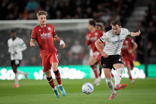 Ryan Hedges of Derby County passes the ball  under pressure from Jimmy Jay-Morgan of West Bromwich Albion during the Sky Bet Championship match Derby County vs West Bromwich Albion at Pride Park Stadium, Derby, United Kingdom on 09 September 2026

(Photo by Maynard Manyowa/News Images)