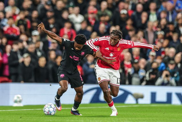 Christian Nwachukwu of Sabah FK and Patrick Dorgu of Manchester United battle for the ball during the UEFA Champions League Matchday 1 of 8 match Manchester United vs Sabah FK at Old Trafford, Manchester, United Kingdom on 10 September 2026

(Photo by Mark Cosgrove/News Images)