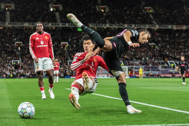 Lisandro Martinez of Manchester United and Akim Zedadka of Sabah FK battle for the ball during the UEFA Champions League Matchday 1 of 8 match Manchester United vs Sabah FK at Old Trafford, Manchester, United Kingdom on 10 September 2026

(Photo by Mark Cosgrove/News Images)