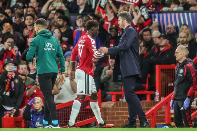 Kobbie Mainoo of Manchester United shakes hands with Michael Carrick manager of Manchester United as he is substituted off during the UEFA Champions League Matchday 1 of 8 match Manchester United vs Sabah FK at Old Trafford, Manchester, United Kingdom on 10 September 2026

(Photo by Mark Cosgrove/News Images)