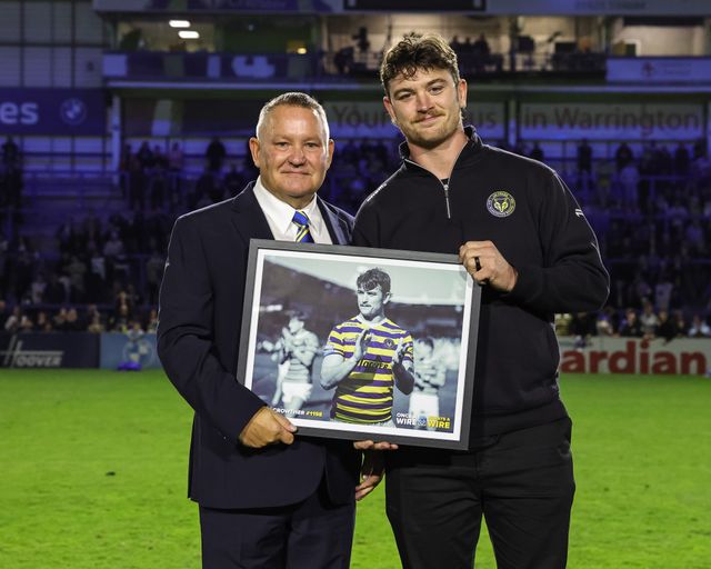 Jordy Crowther of Warrington Wolves receives a presentation from Warrington Wolves chairman Stuart Middleton during the Betfred Super League round 27 match Warrington Wolves vs Toulouse Olympique at The Halliwell Jones Stadium, Warrington, United Kingdom on 11 September 2026

(Photo by Mark Cosgrove/News Images)