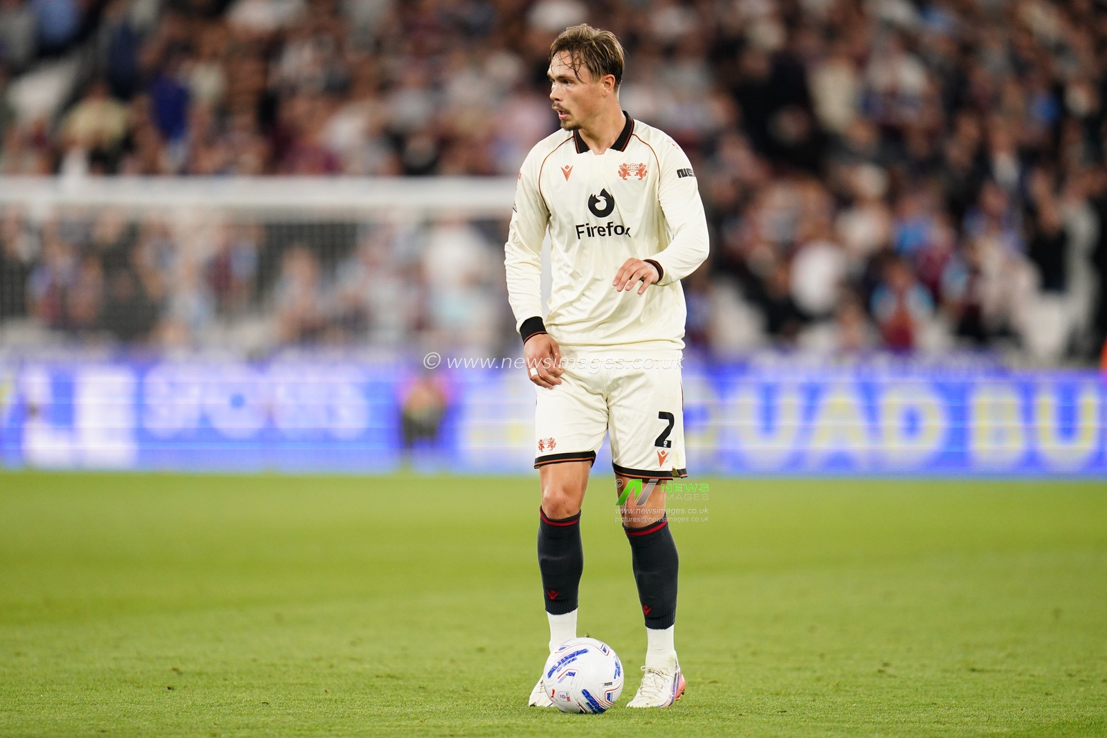 Callum Doyle of Wrexham with the ball during the Sky Bet Championship match West Ham United vs Wrexham at London Stadium, London, United Kingdom on 11 September 2026

(Photo by Harvey Murphy/News Images)