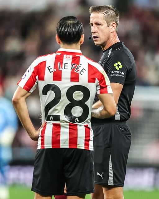 Enzo Le Fee of Sunderland appeals to referee John Brooks during the Premier League match Sunderland vs Arsenal at Stadium Of Light, Sunderland, United Kingdom on 12 September 2026

(Photo by Alfie Cosgrove/News Images)
