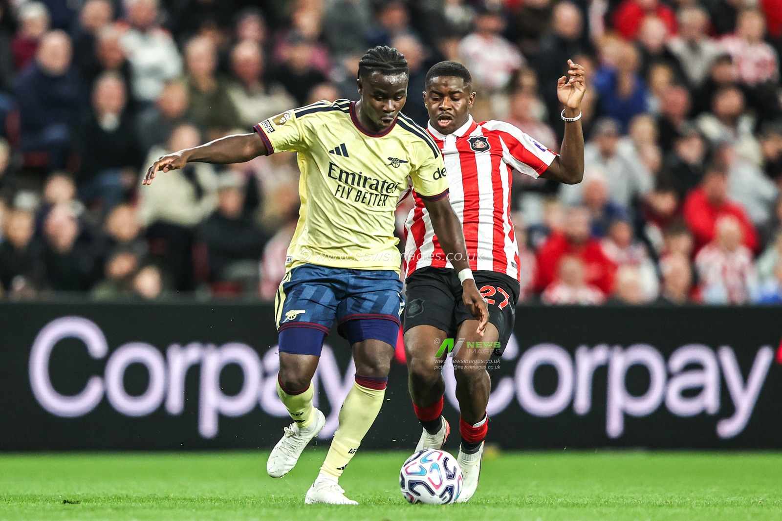 Bukayo Saka of Arsenal and Reinildo Mandava of Sunderland battle for the ball during the Premier League match Sunderland vs Arsenal at Stadium Of Light, Sunderland, United Kingdom on 12 September 2026

(Photo by Alfie Cosgrove/News Images)