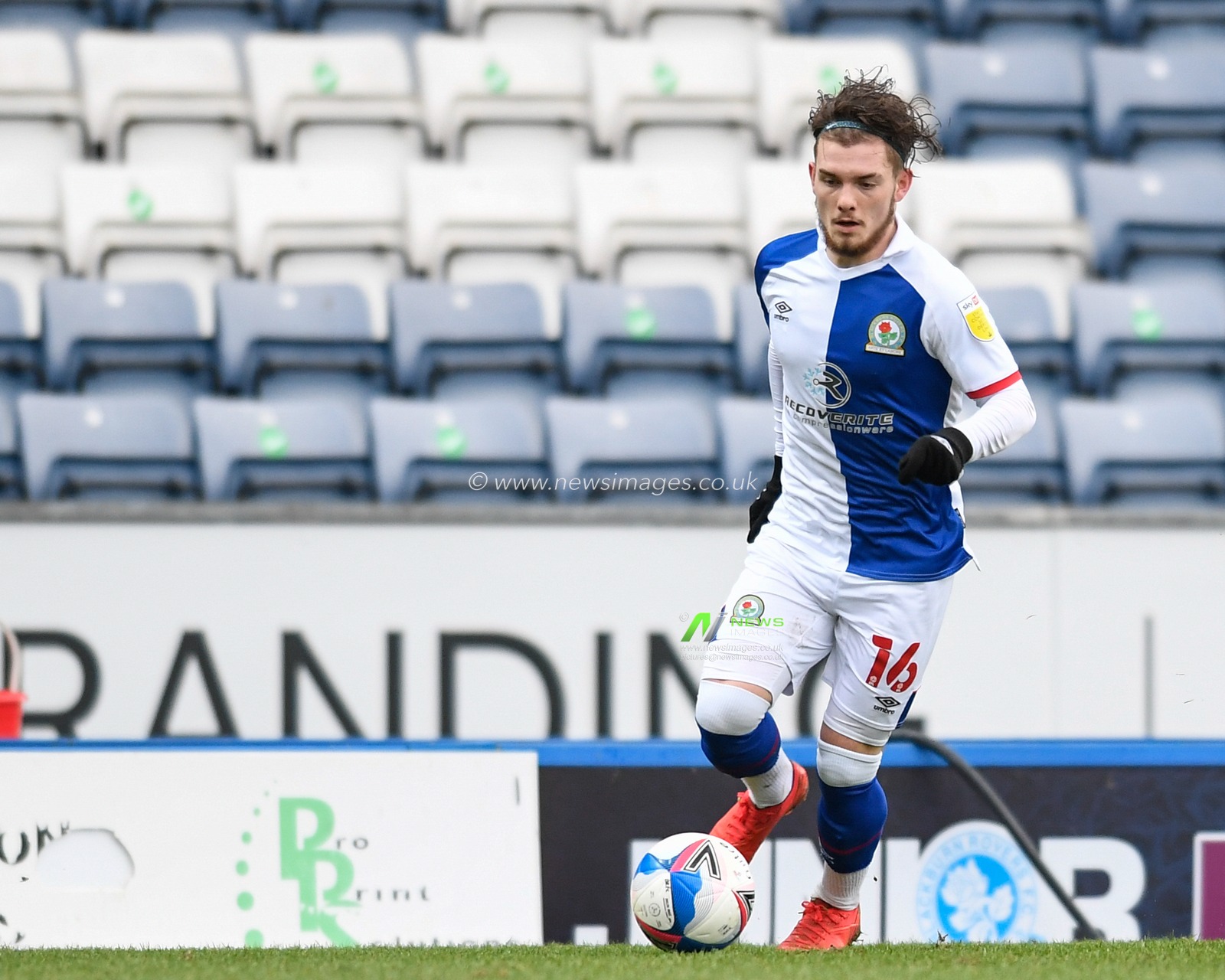 Harvey Elliott #16 of Blackburn Rovers runs forward with the ball