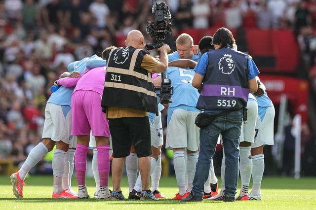 Manchester City team huddle during the Premier League match Manchester United vs Manchester City at Old Trafford, Manchester, United Kingdom on 13 September 2026

(Photo by Mark Cosgrove/News Images)