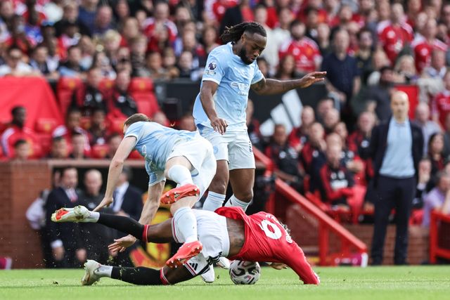 Marcus Rashford of Manchester United is fouled by Elliot Anderson of Manchester City during the Premier League match Manchester United vs Manchester City at Old Trafford, Manchester, United Kingdom on 13 September 2026

(Photo by Mark Cosgrove/News Images)