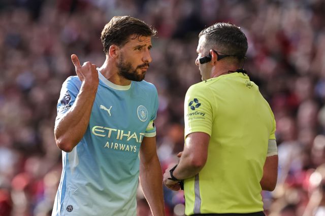 Ruben Dias of Manchester City appeals to referee Michael Oliver after Foden is sent off during the Premier League match Manchester United vs Manchester City at Old Trafford, Manchester, United Kingdom on 13 September 2026

(Photo by Mark Cosgrove/News Images)