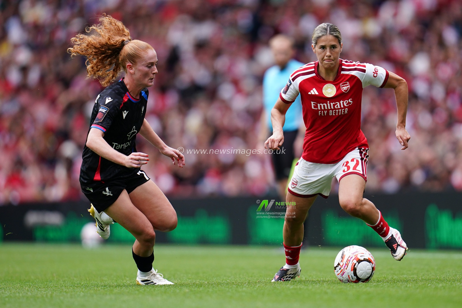 Kyra Cooney-Cross of Arsenal with the ball under pressure during the Women's Super League match Arsenal vs Crystal Palace at Emirates, London, United Kingdom on 13 September 2026

(Photo by Harvey Murphy/News Images)
