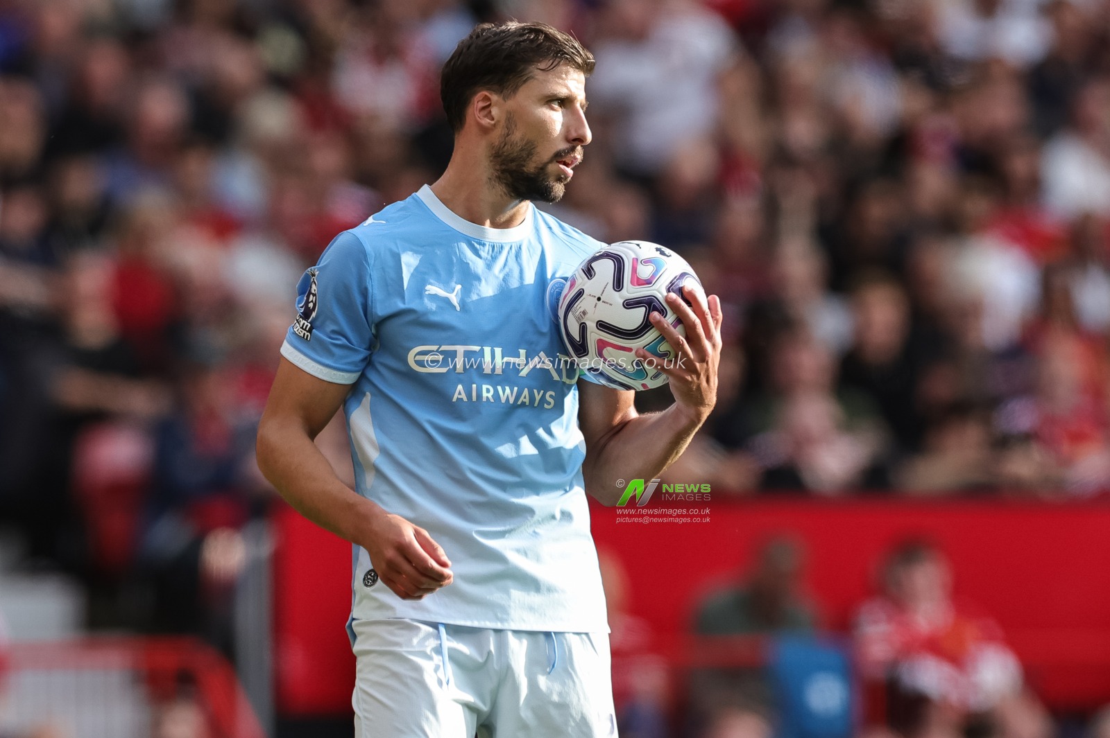 Ruben Dias of Manchester City holds the ball during the Premier League match Manchester United vs Manchester City at Old Trafford, Manchester, United Kingdom on 13 September 2026

(Photo by Mark Cosgrove/News Images)