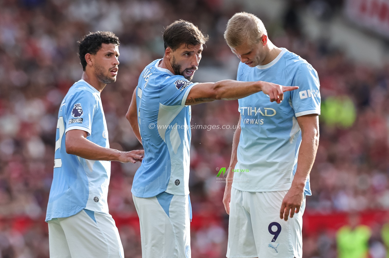 Ruben Dias of Manchester City speaks with Matheus Nunes of Manchester City and Erling Haaland of Manchester City during the Premier League match Manchester United vs Manchester City at Old Trafford, Manchester, United Kingdom on 13 September 2026

(Photo by Mark Cosgrove/News Images)