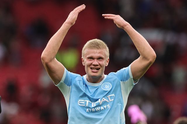 Goalscorer Erling Haaland of Manchester City celebrates the 0-1 win with the City cans during the Premier League match Manchester United vs Manchester City at Old Trafford, Manchester, United Kingdom on 13 September 2026

(Photo by Mark Cosgrove/News Images)