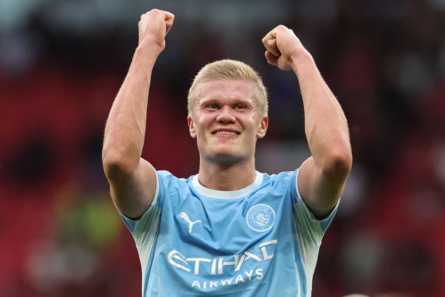Goalscorer Erling Haaland of Manchester City celebrates the 0-1 win with the City cans during the Premier League match Manchester United vs Manchester City at Old Trafford, Manchester, United Kingdom on 13 September 2026

(Photo by Mark Cosgrove/News Images)