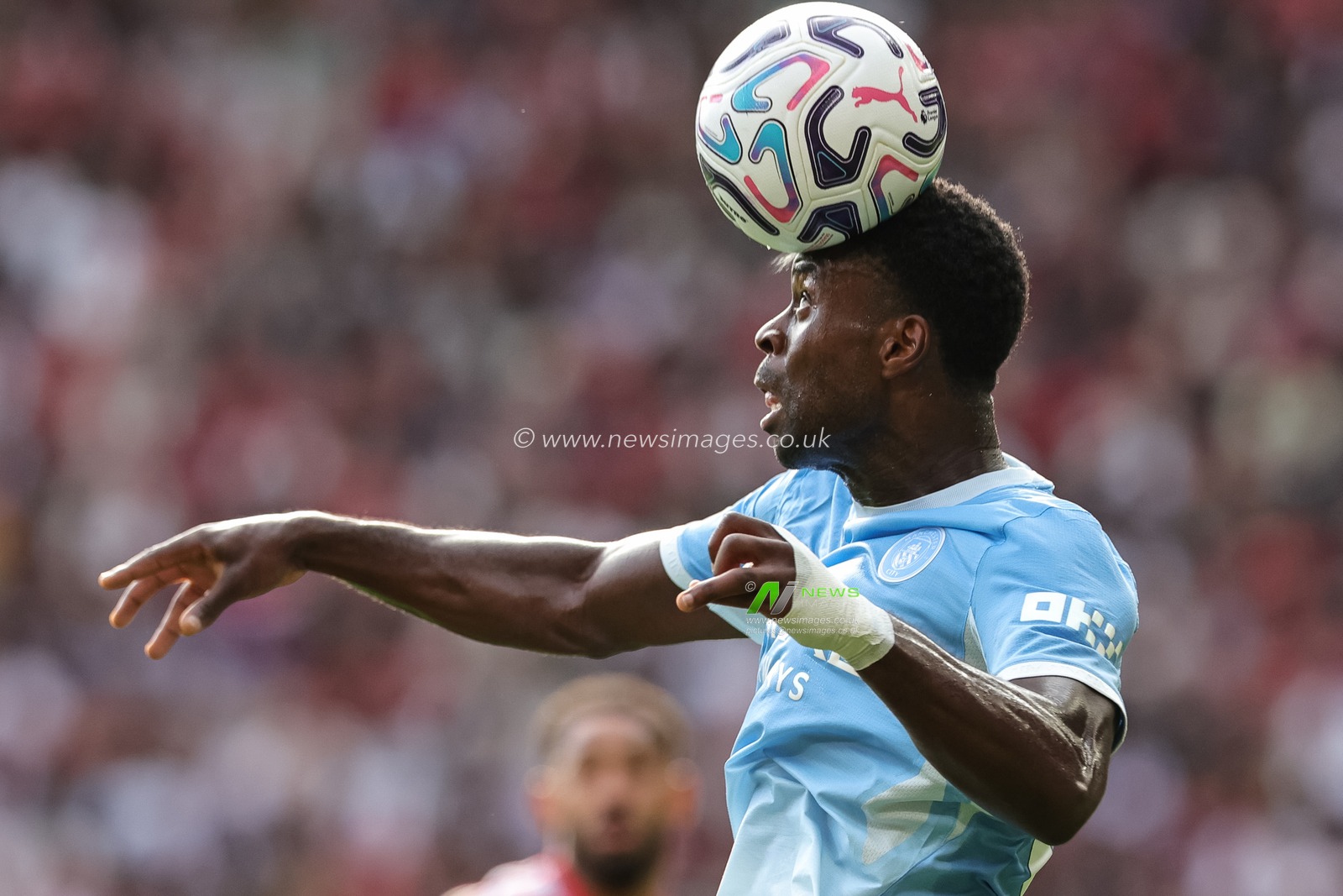 Marc Guehi of Manchester City heads the ball during the Premier League match Manchester United vs Manchester City at Old Trafford, Manchester, United Kingdom on 13 September 2026

(Photo by Mark Cosgrove/News Images)