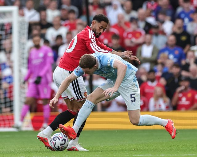 Matheus Cunha of Manchester United and Elliot Anderson of Manchester City battle for the ball during the Premier League match Manchester United vs Manchester City at Old Trafford, Manchester, United Kingdom on 13 September 2026

(Photo by Mark Cosgrove/News Images)