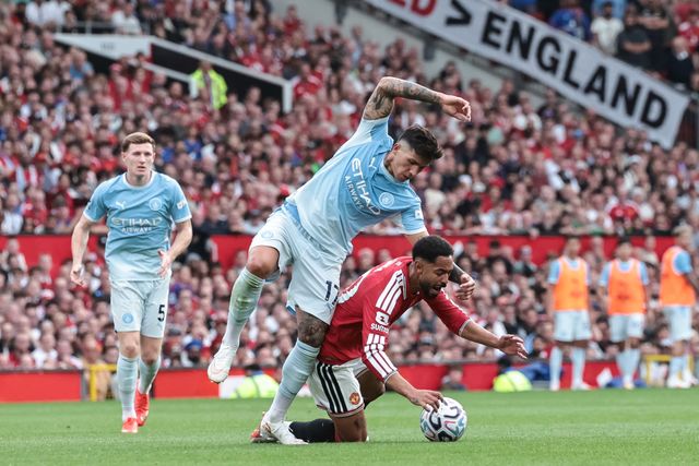 Enzo Fernandez of Manchester City fouled Matheus Cunha of Manchester United during the Premier League match Manchester United vs Manchester City at Old Trafford, Manchester, United Kingdom on 13 September 2026

(Photo by Mark Cosgrove/News Images)