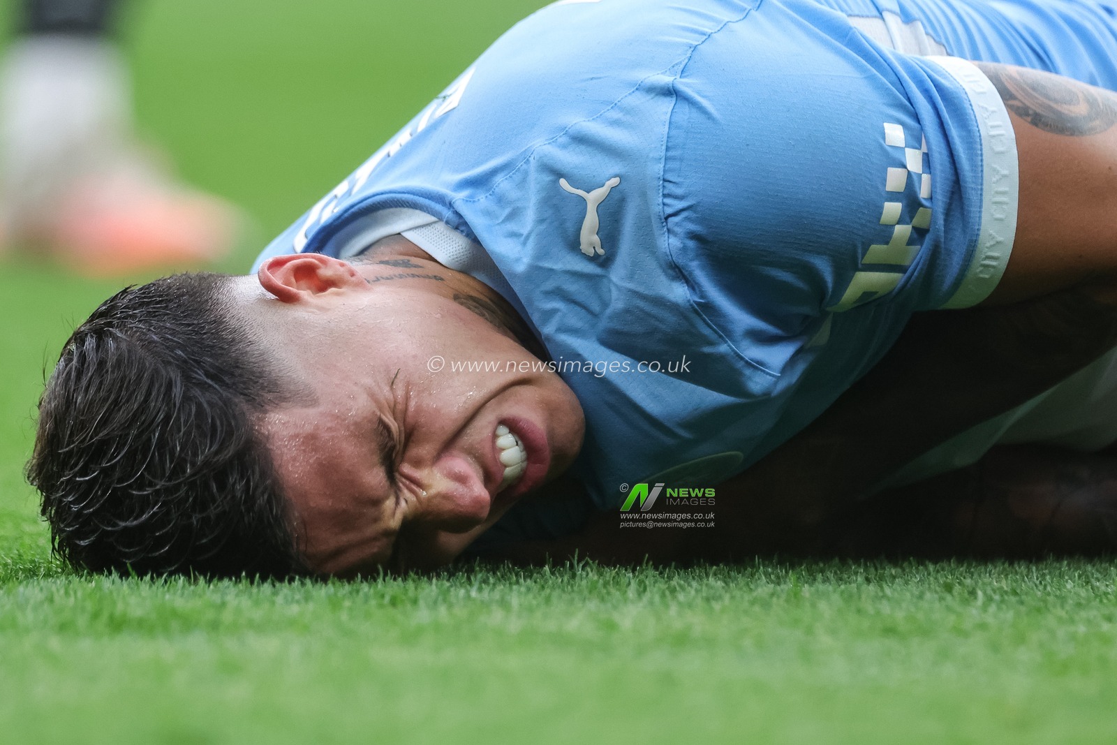 Enzo Fernandez of Manchester City reacts after taking a knock where he received a yellow card during the Premier League match Manchester United vs Manchester City at Old Trafford, Manchester, United Kingdom on 13 September 2026

(Photo by Mark Cosgrove/News Images)