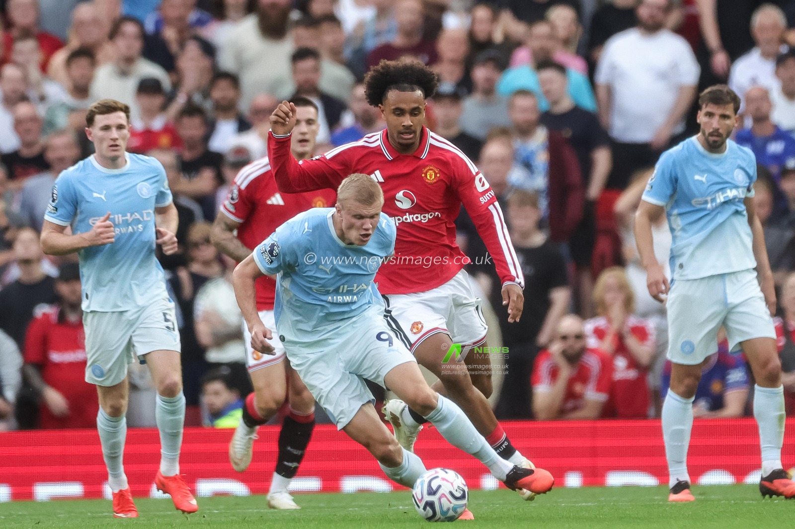 Erling Haaland of Manchester City breaks with the ball during the Premier League match Manchester United vs Manchester City at Old Trafford, Manchester, United Kingdom on 13 September 2026

(Photo by Mark Cosgrove/News Images)