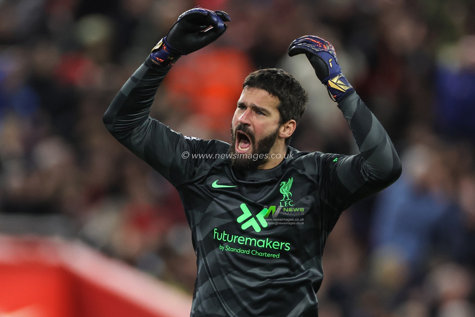 Alisson Becker of Liverpool gees up the crowd during the Premier League match Liverpool vs Manchester United at Anfield, Liverpool, United Kingdom, 17th December 2023

(Photo by Mark Cosgrove/News Images)